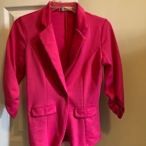 Hot pink blazer.